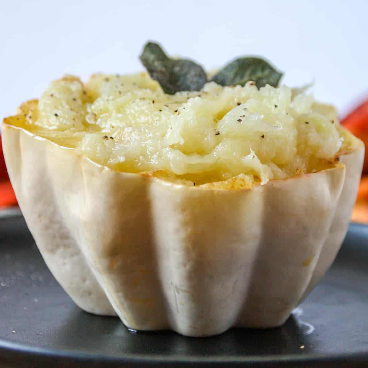 Mashed potato squash served in a half shell.