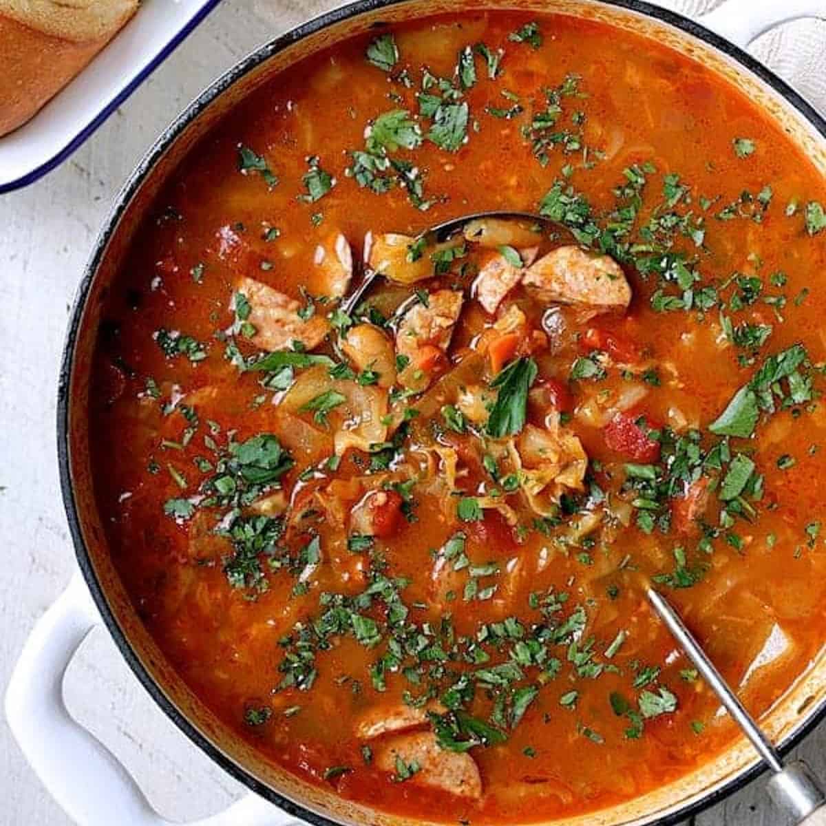 Cabbage soup in a pot.